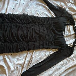 It’s a black homecoming dress I only wore it once great condition